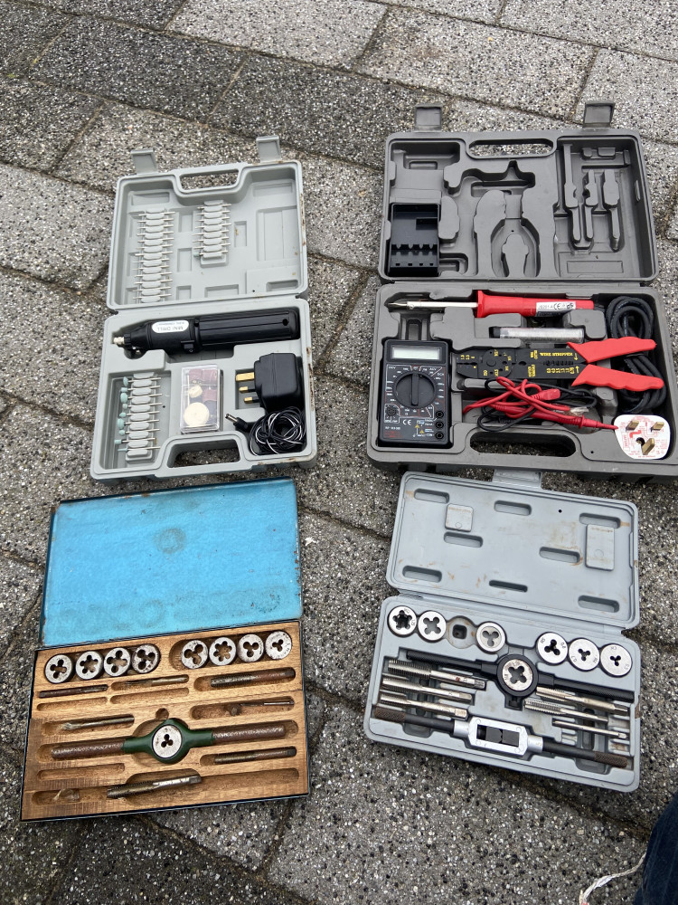 Tap and die sets and other cased tools