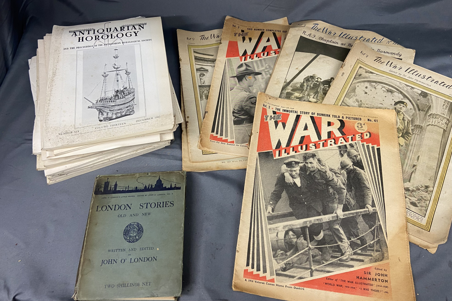 Vintage Horology magazines, London stories book and a collection of War illustrated magazines