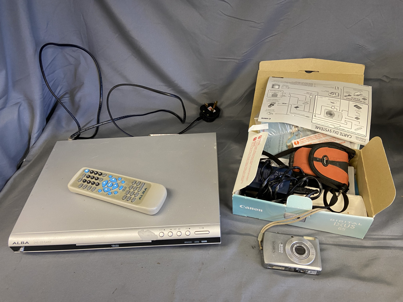 DVD player with remote and digital camera