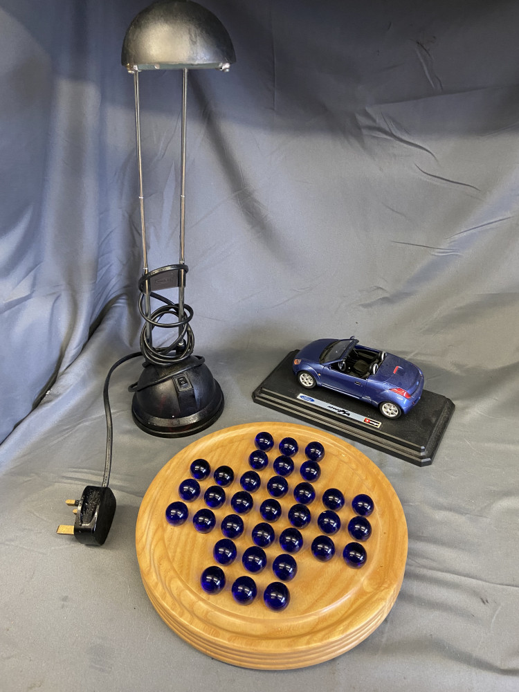 Marble Solitaire Game, KA model and desk lamp