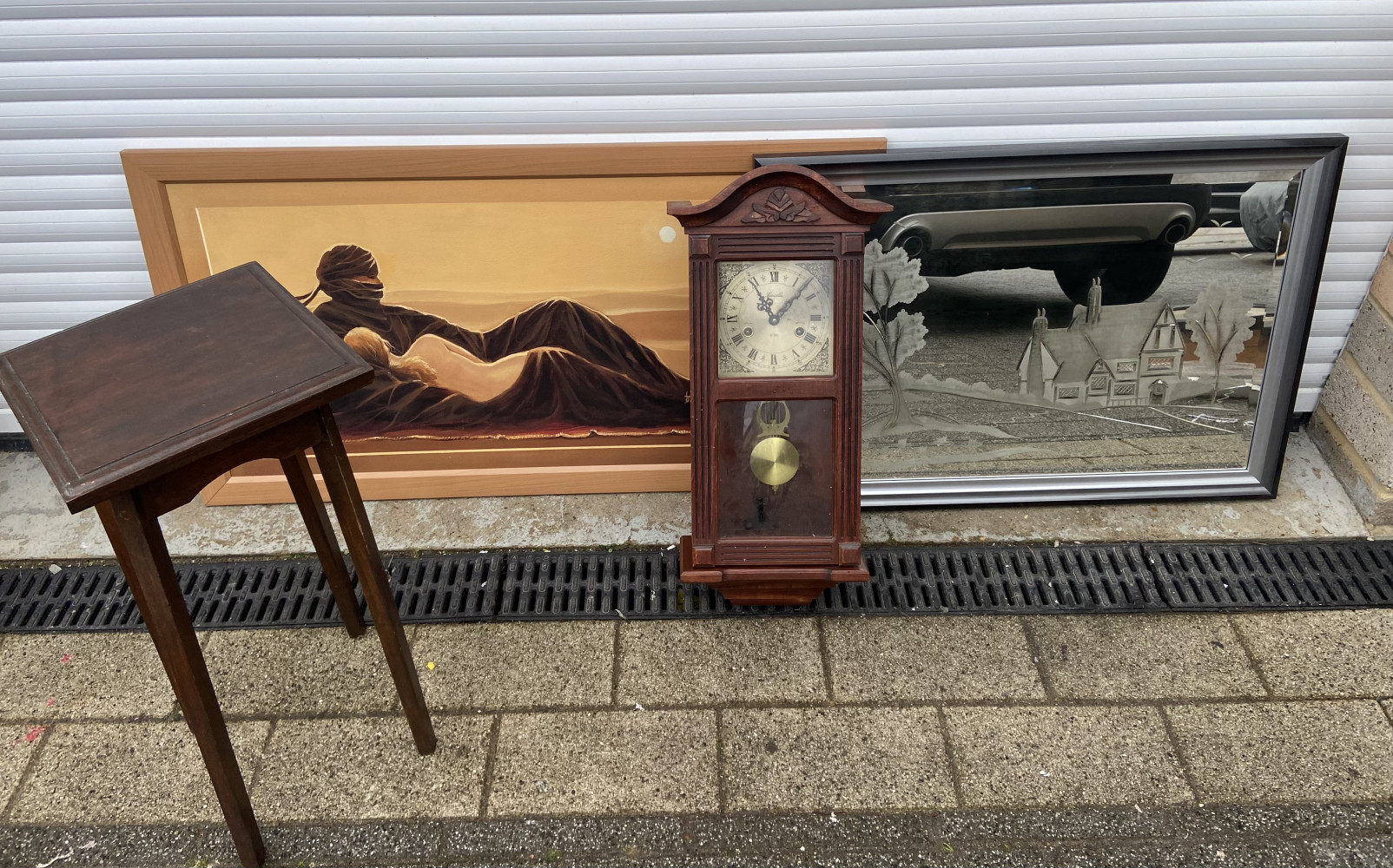Side table, clock, large picture and mirror