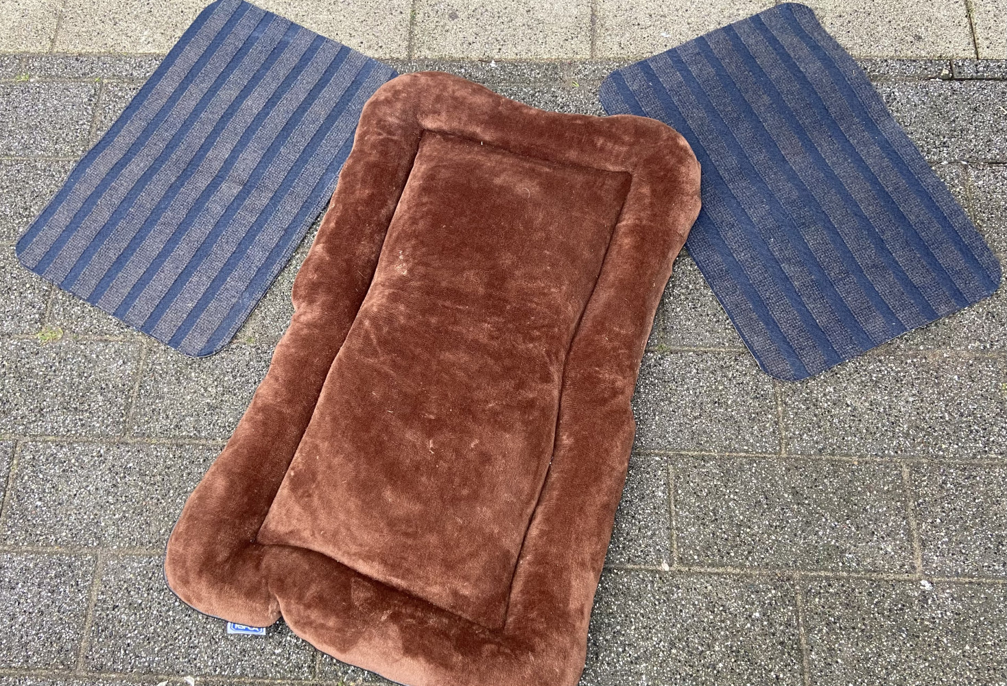 As new dog bed and two new door matts