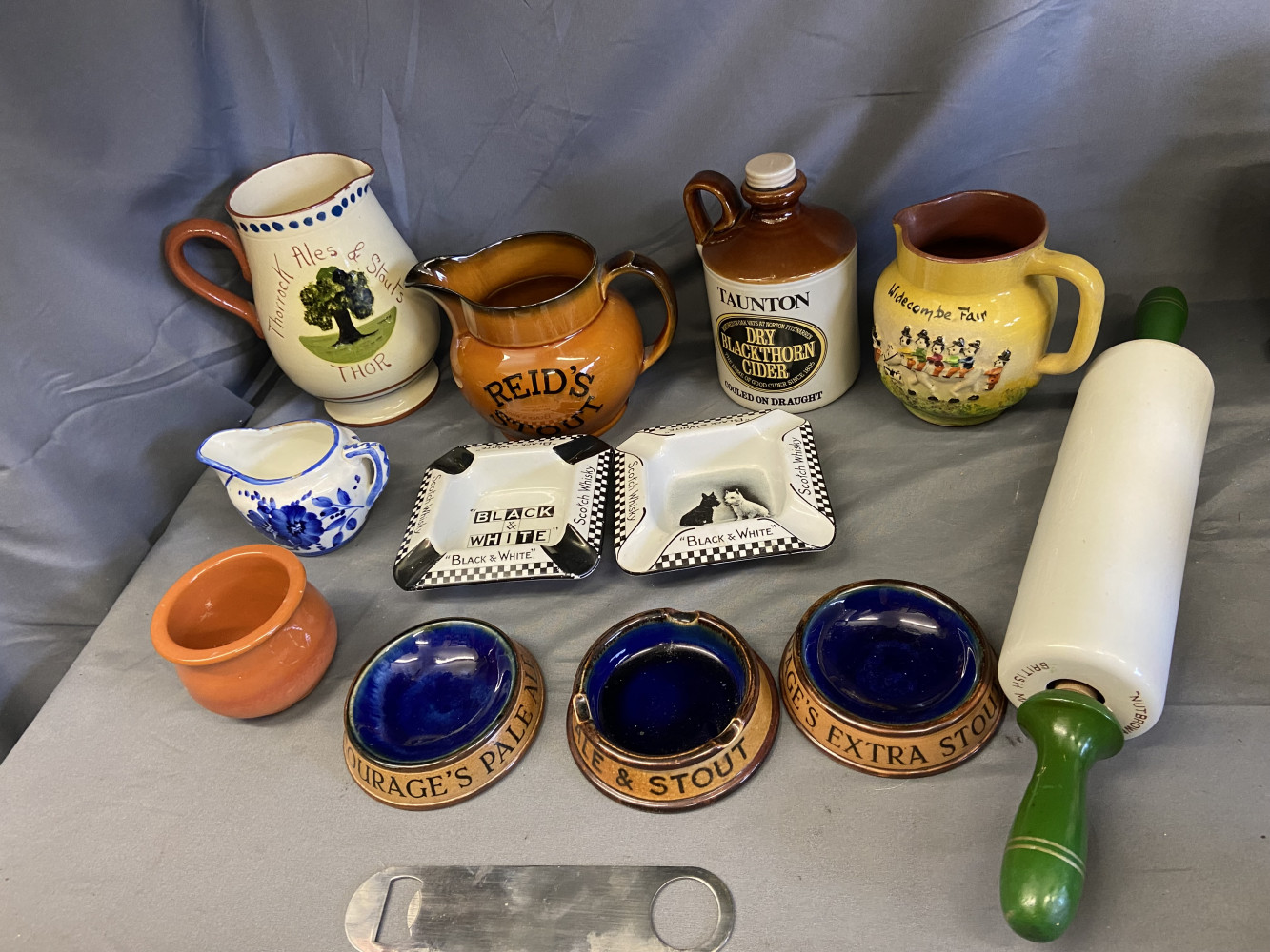 Vintage bar ware, jugs and ash trays also vintage rolling pin
