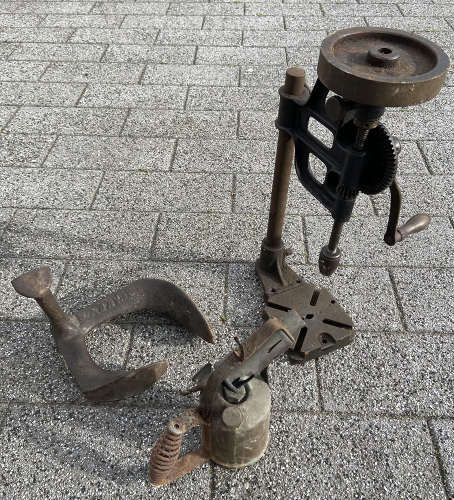 Vintage drill, blow torch and shoe last