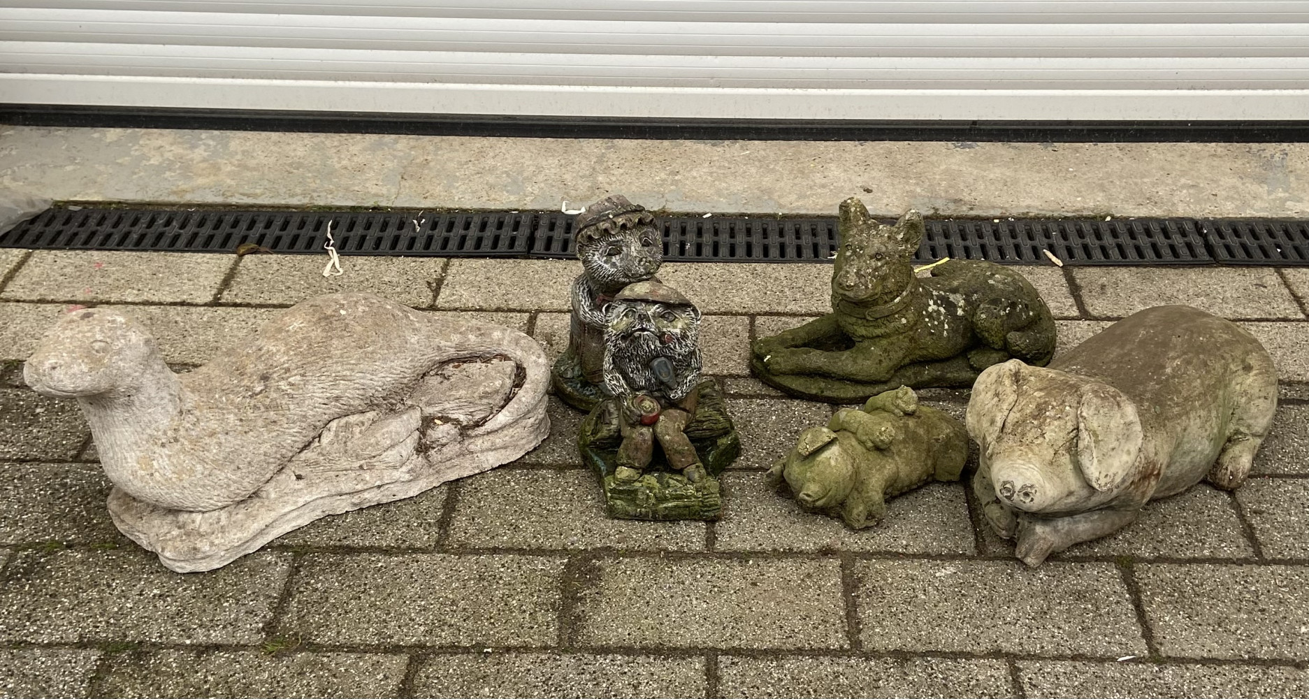 6 garden statues, large pig, otter, dog and others
