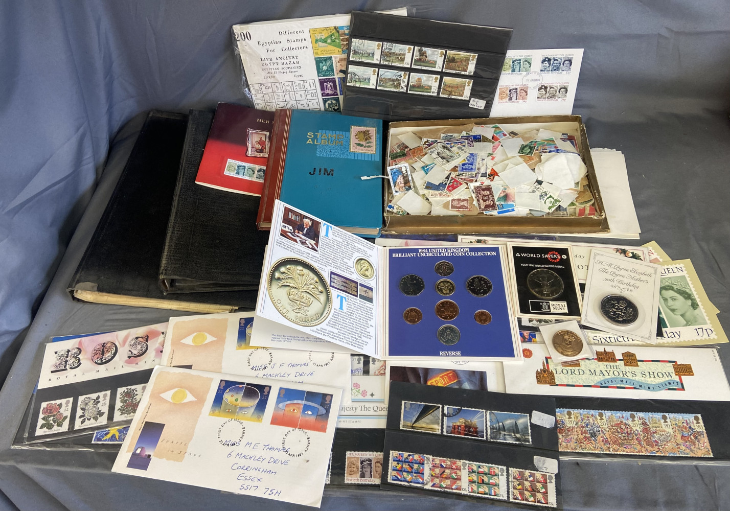 Stamp albums, coins, loads of lose stamps huge collection