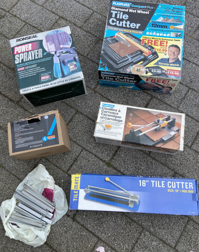 3 tile cutters, fence sprayer, outside light and bag of handles