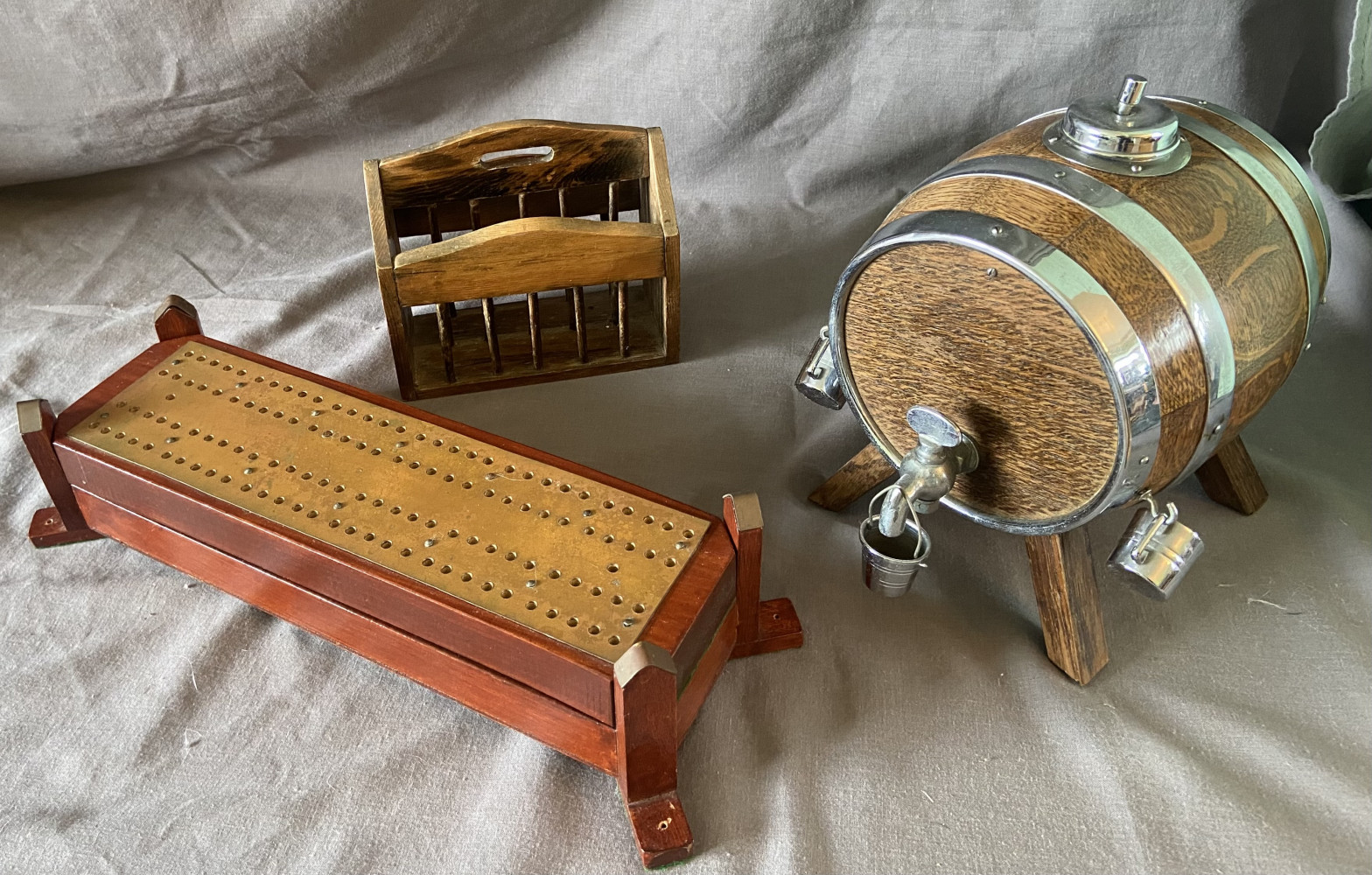 Chrome banded wooden barrel, wooden letter holder and cribbage board