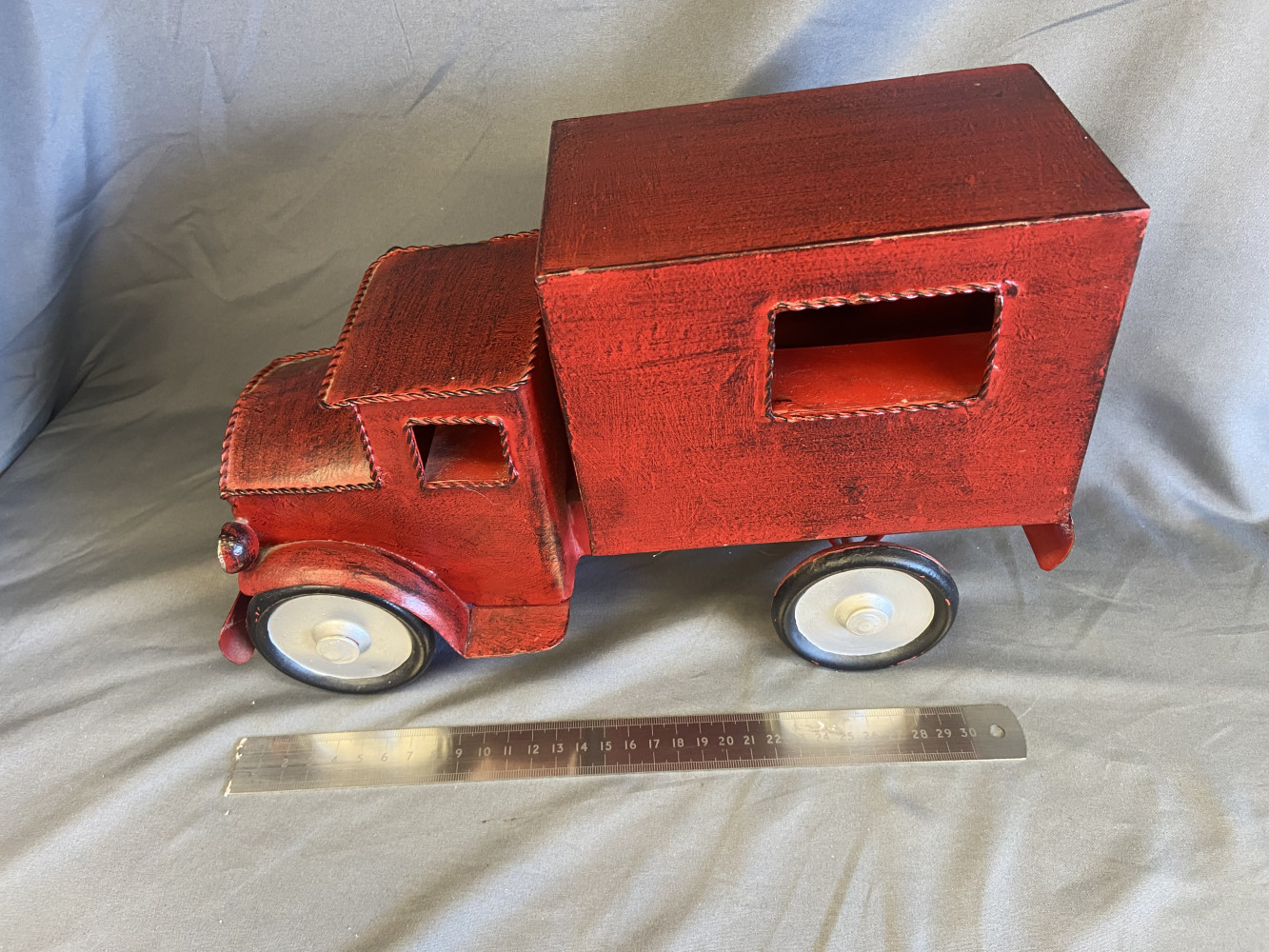 Red Metal Tin Trick 33cms long,