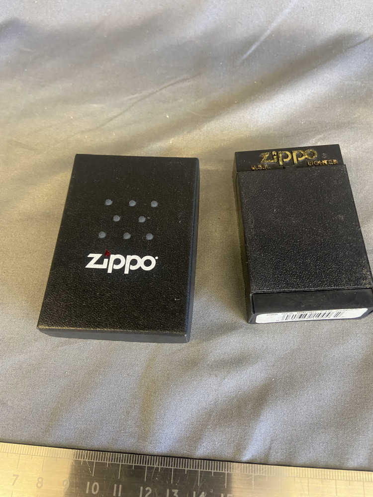 Two Zippo Lighters