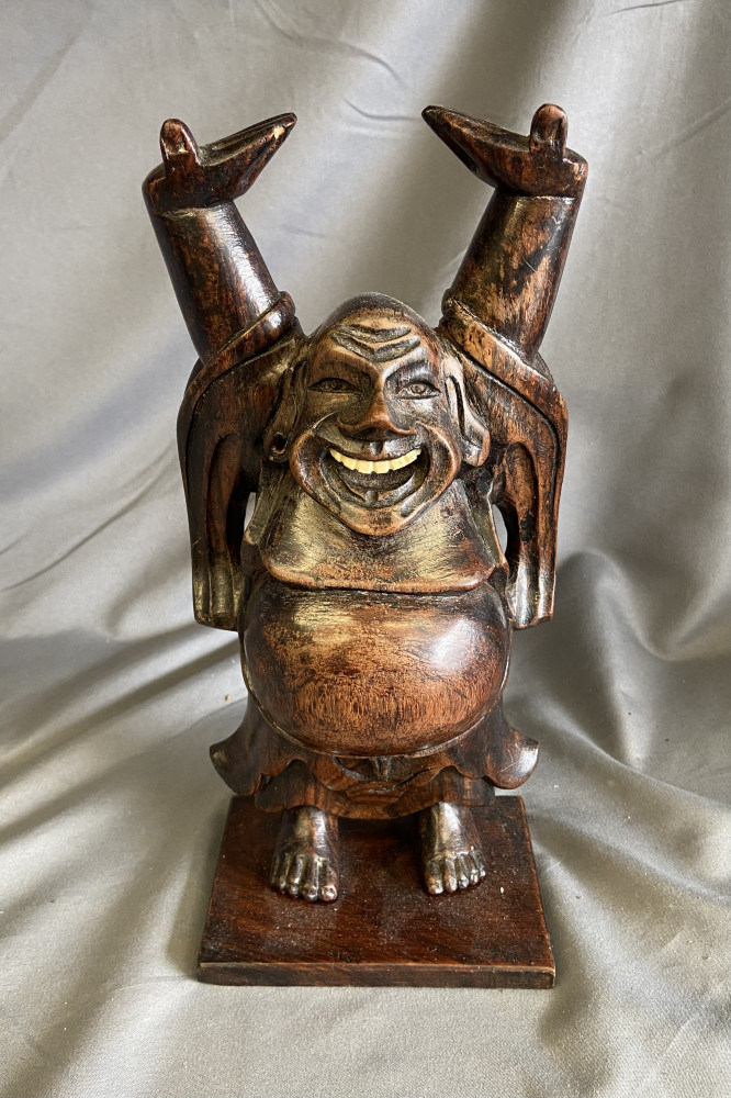 Carved wooden Budda cms tall