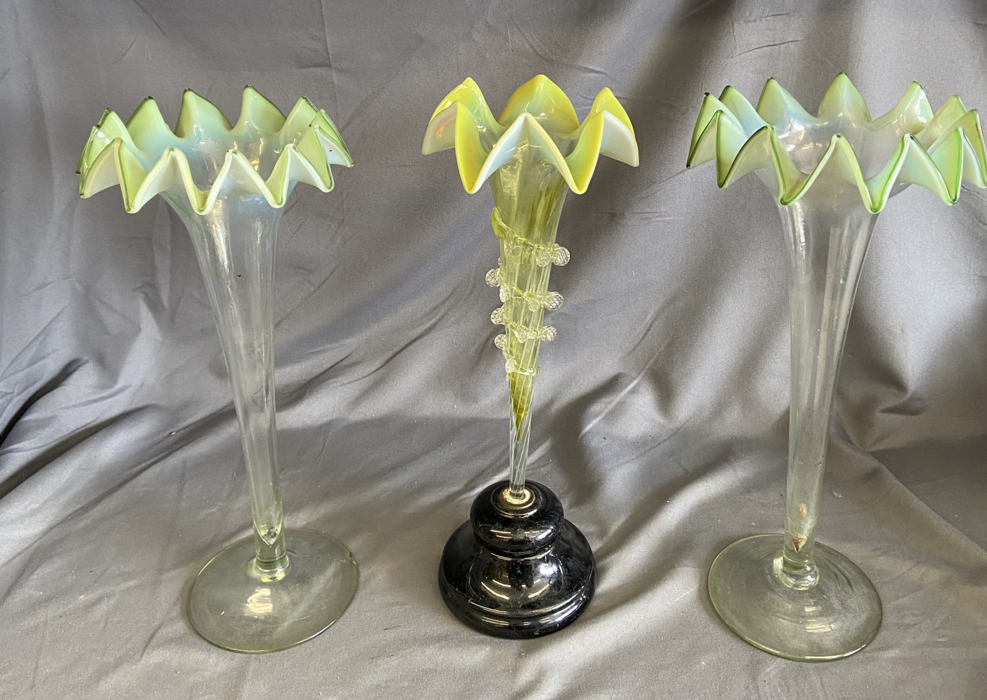 Pair of Victorian-era Vaseline glass epergnes and one other