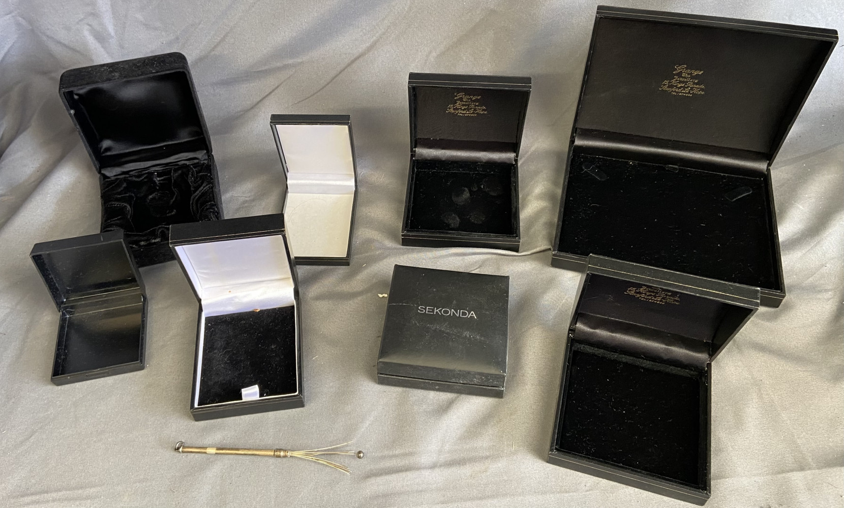 Hallmarked swizzle stick and 8 empty watch or jewellery boxes