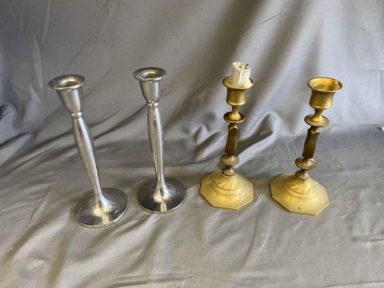 2 pairs of Candle sticks one brass