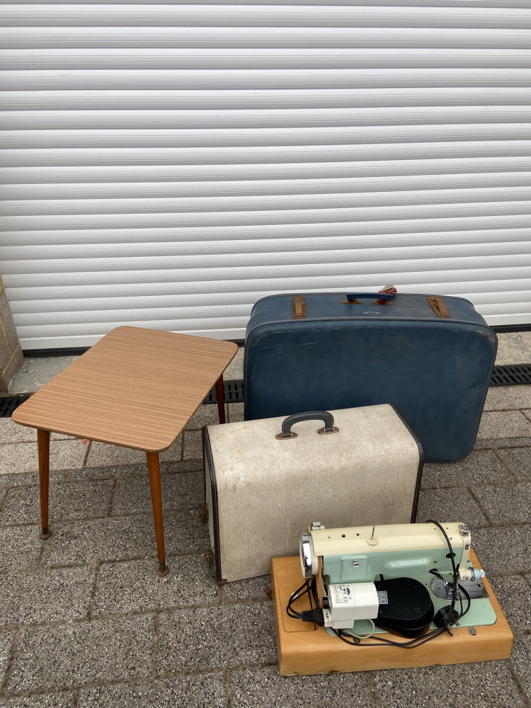 Vintage suitcase, table and sowing machine