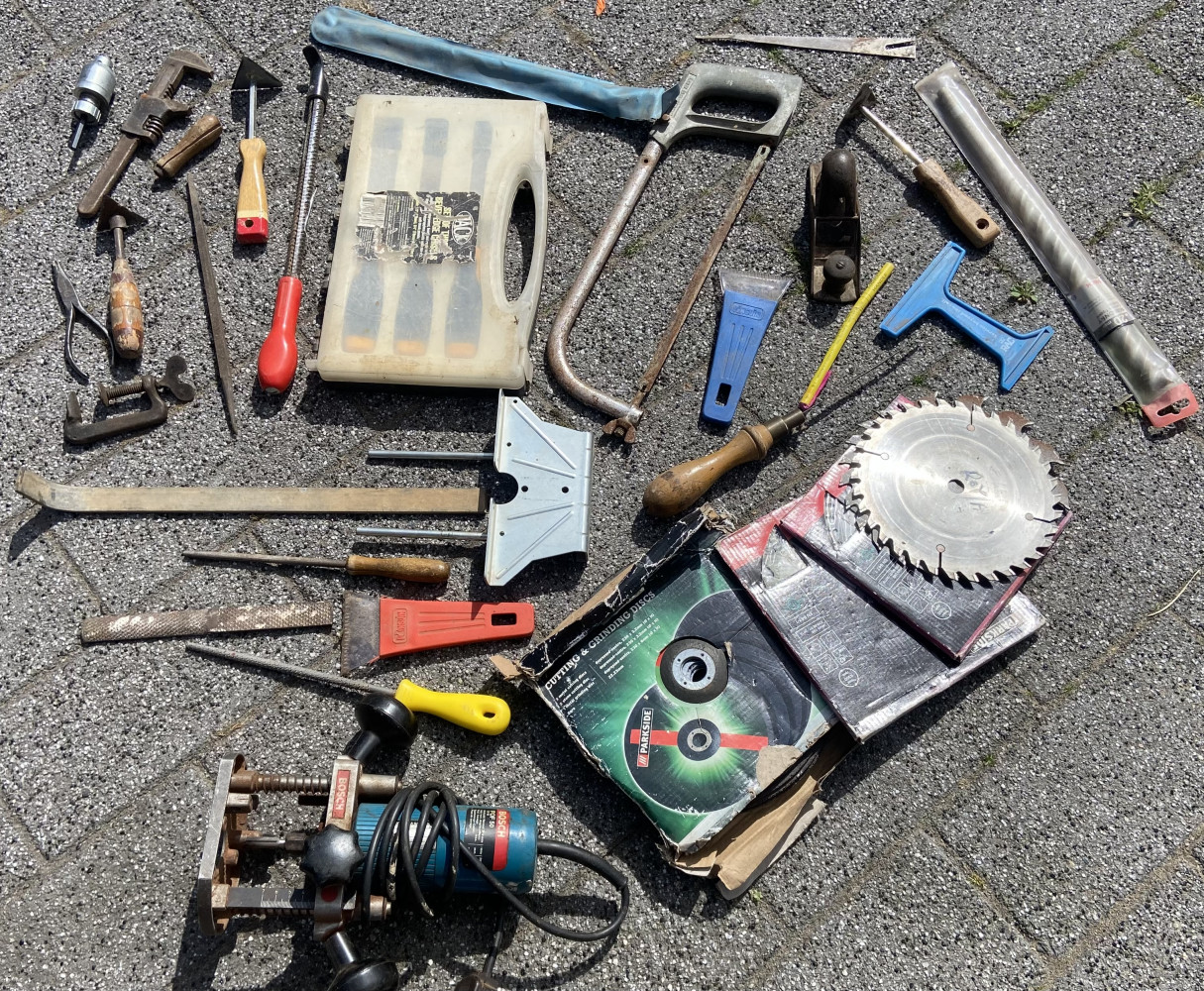 Mixed tools including chisel set and router