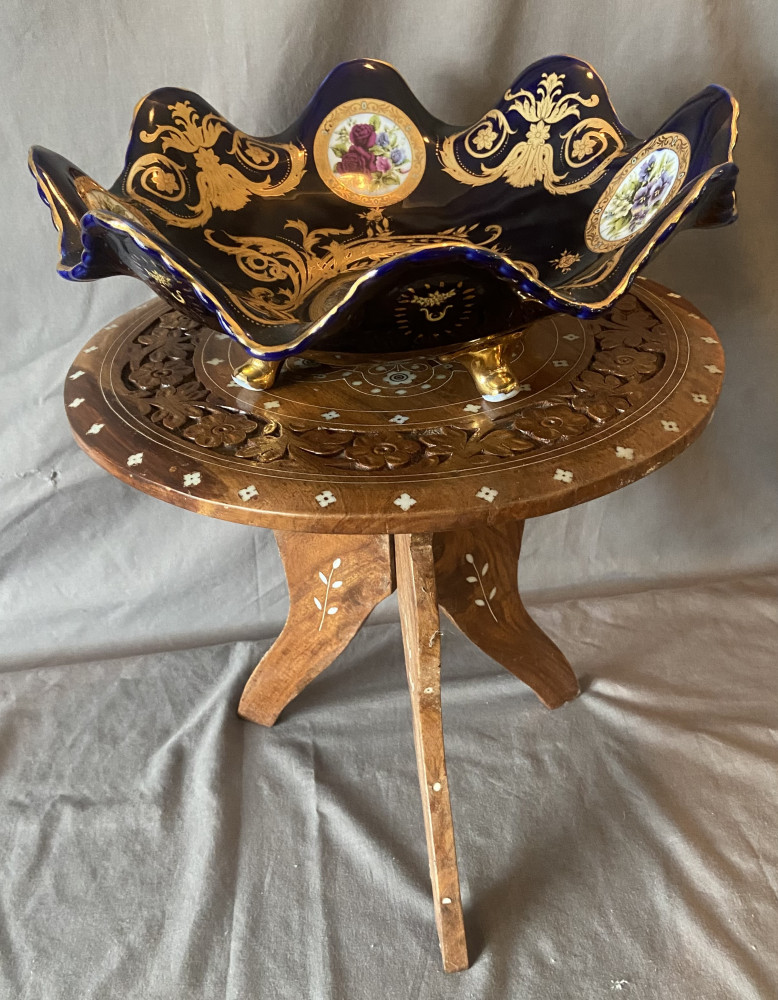 Folding inlaid table 34cms dia and decorative porcelain bowl