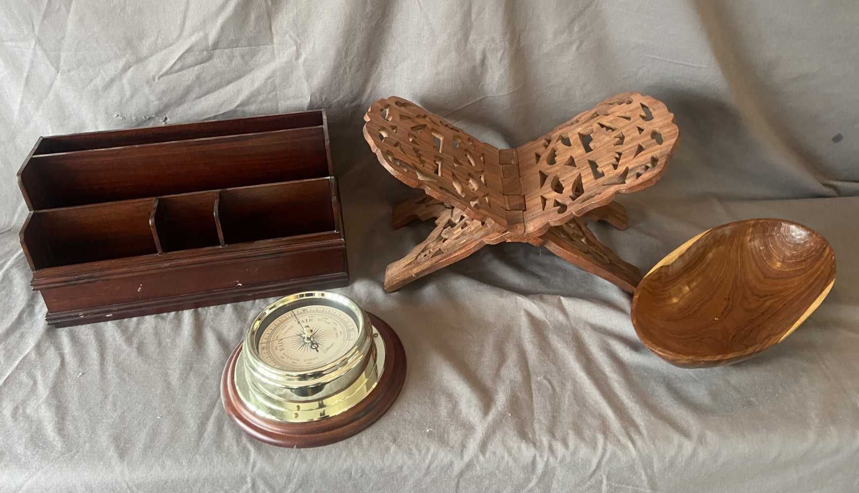 Wooden items including desk tidy, book stand, barometer and bowl