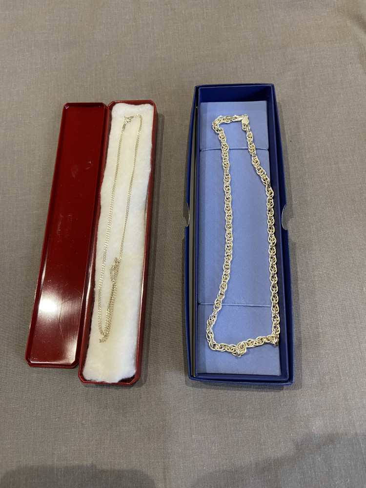 2 silver chains one marked Italy 925 the other marked 925, total 16.6 grams