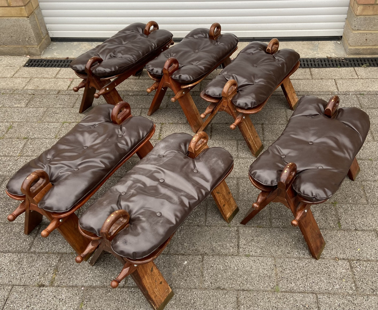 Six camel stools with brass inlay