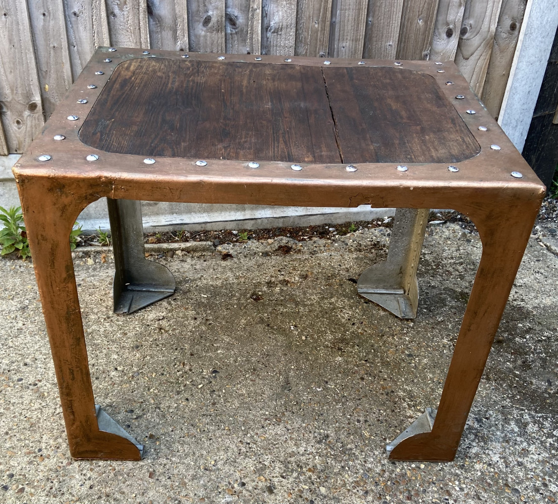 Coffee or garden table made from an old water tank