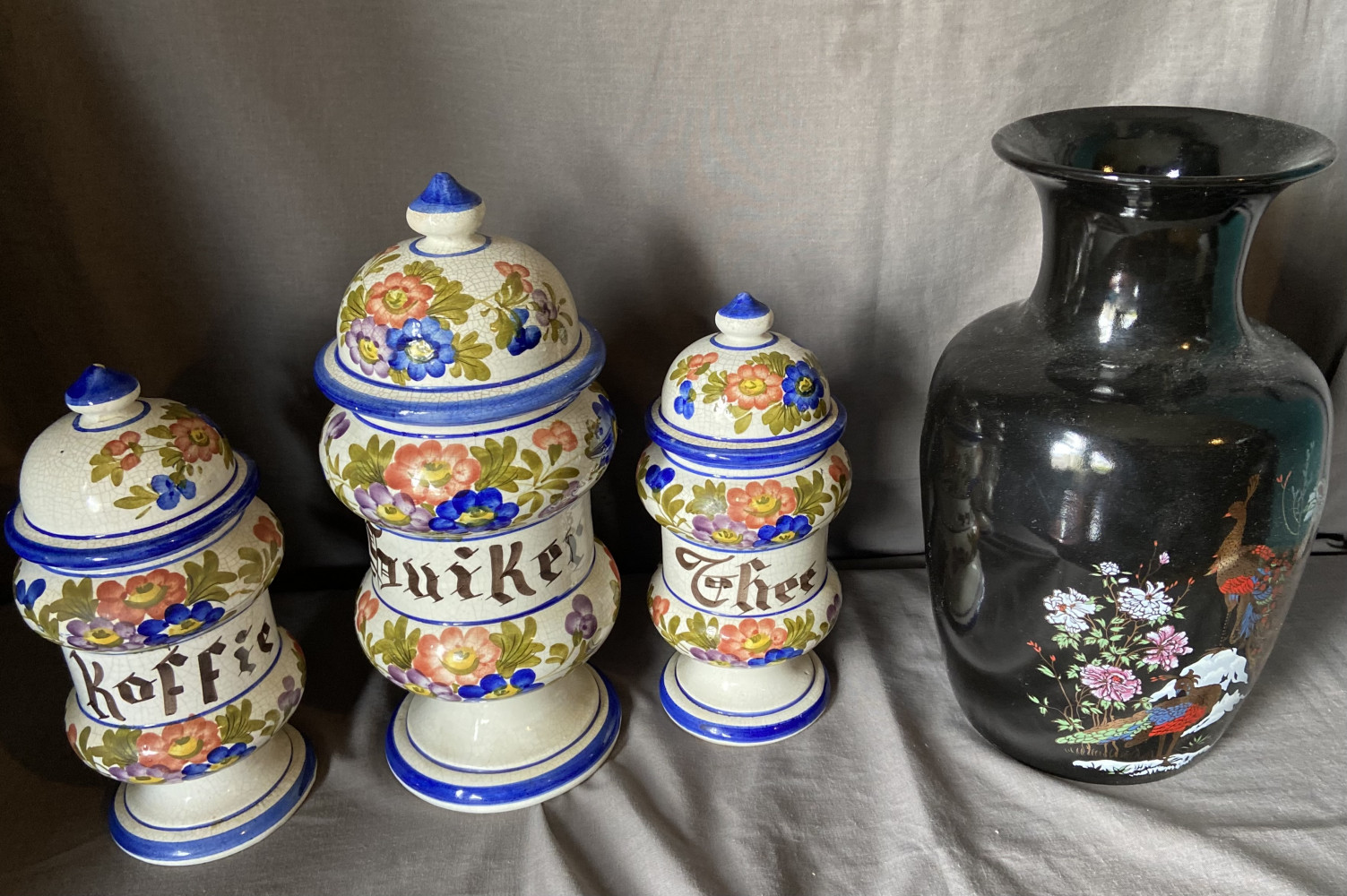 Vintage ceramic kitchen storage jars and vintage Japanese black ceramic vase featuring a floral and peacock design