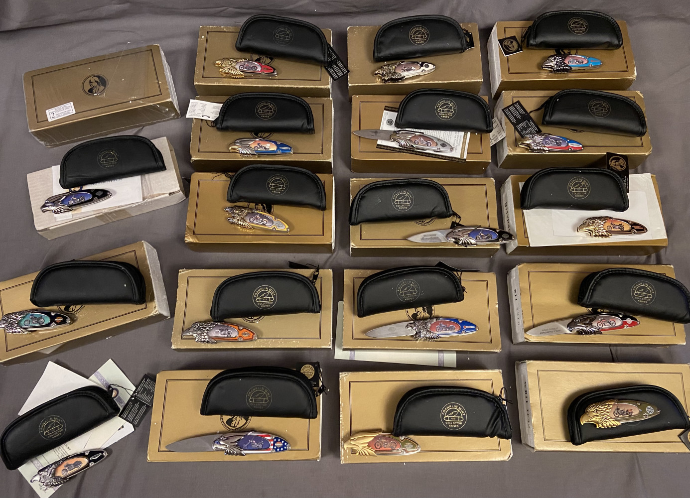 19 Franklin Mint Harley Davidson Collector Knives each knife based on a different Harley, lot of money to buy new, fantastic condition