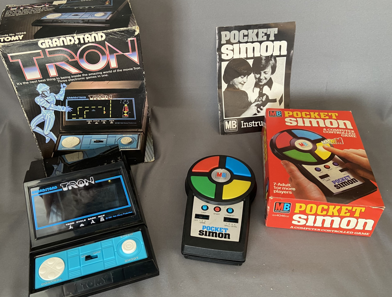 1980s Boxed Pocket Simon and Tron tabletop electronic game
