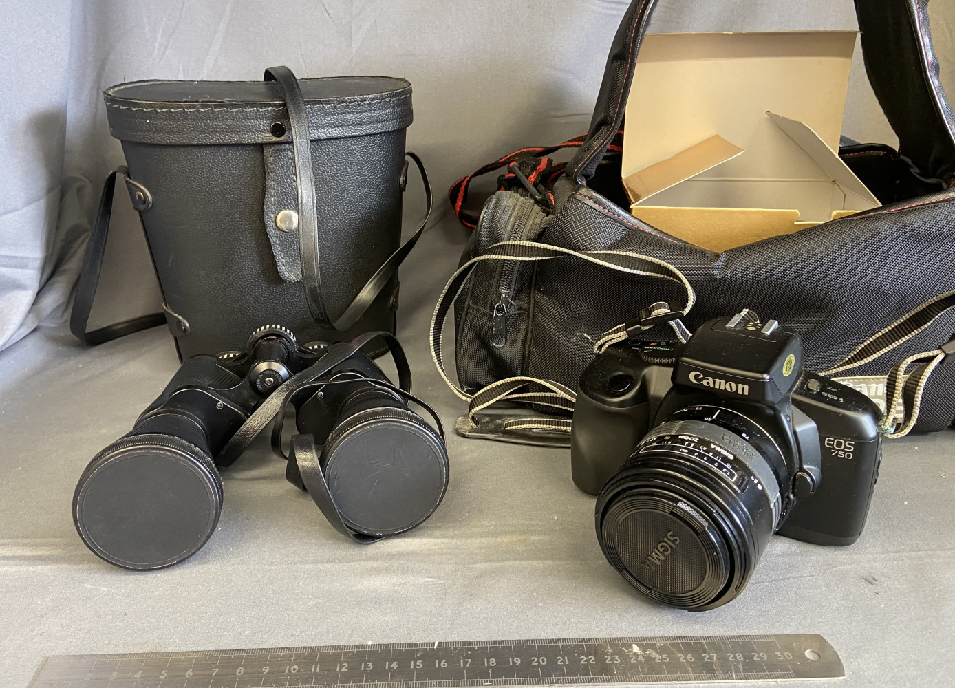 Canon EOS 750 35mm film SLR camera and Sigma 70-210mm auto focus zoom lens and pair of Prinzlux Binoculars