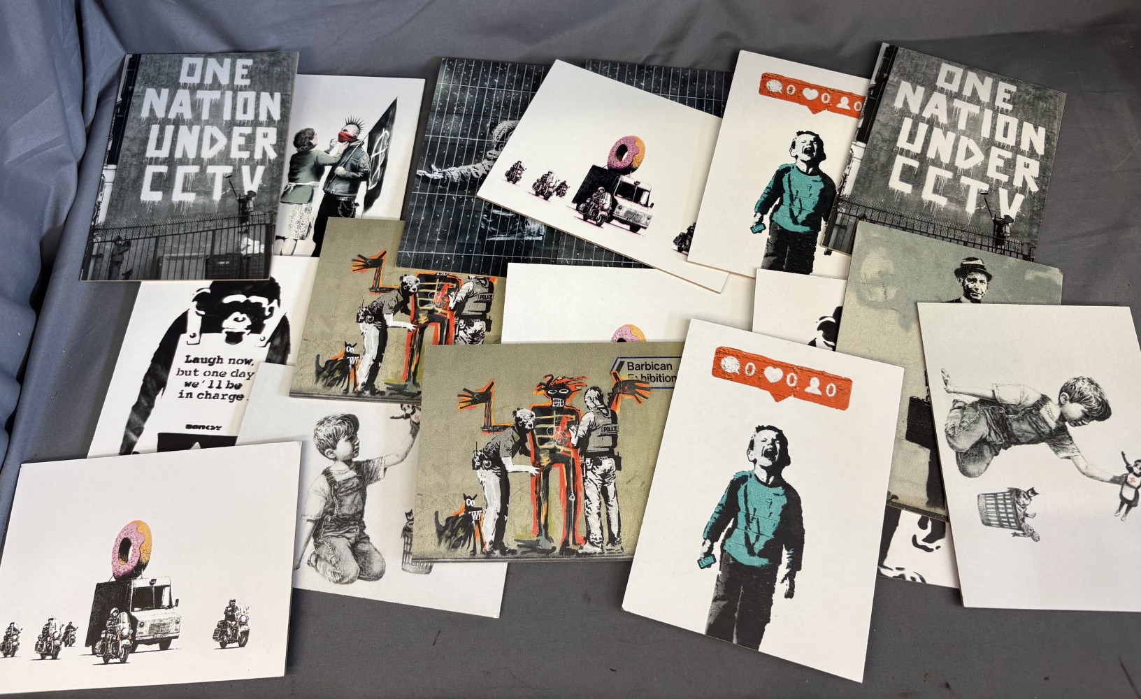 Lot of A5 banksy prints on board