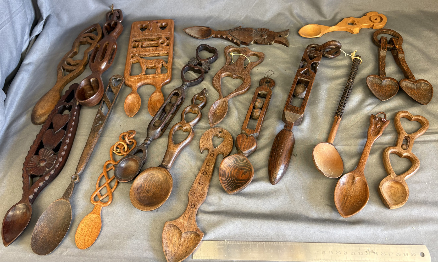 Large lot of 17 love spoons
