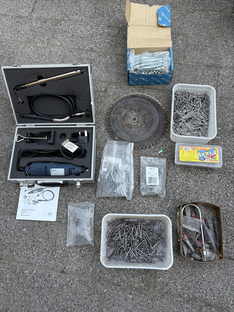 Large lot of nails, fishing weights, saw blades, electric hand tool,
