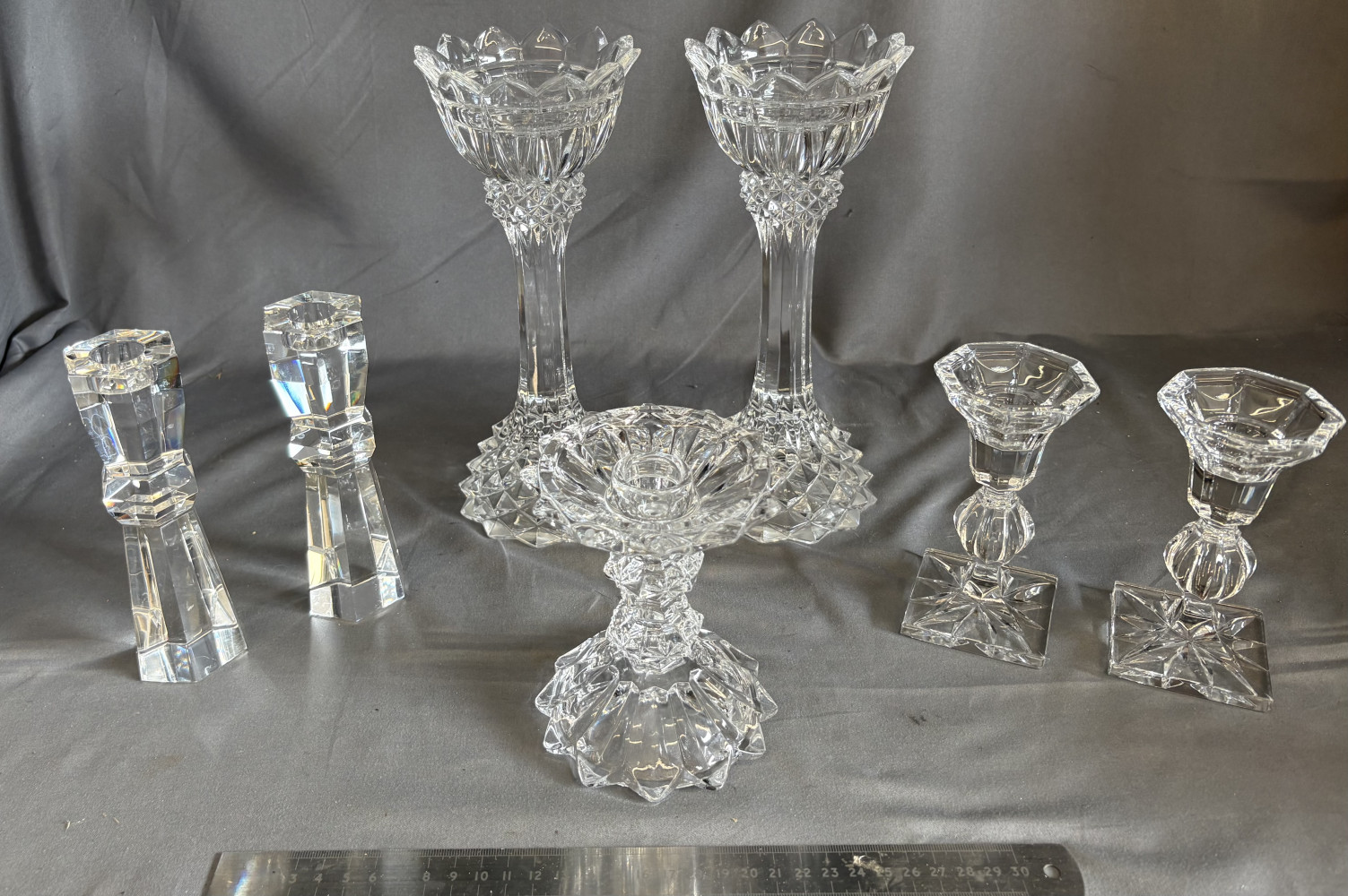 3 sets of Quality Crystal Candlesticks and one other, tallest ones 25 cms