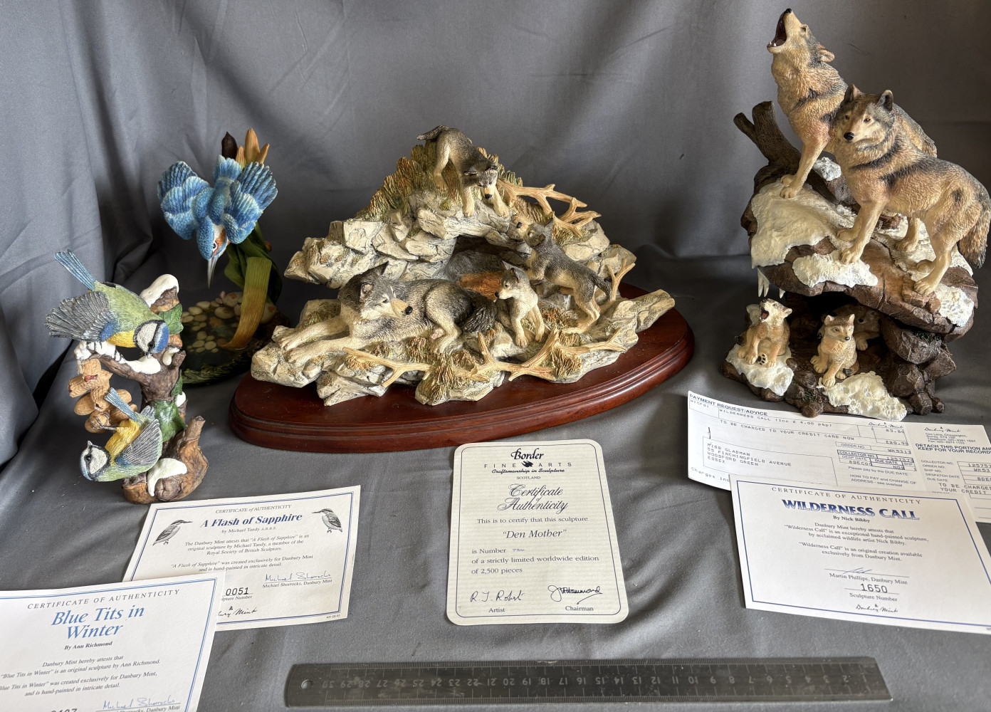 Boarder fine arts and Danbury mint figures of Wolfs and birds all with their original certificates