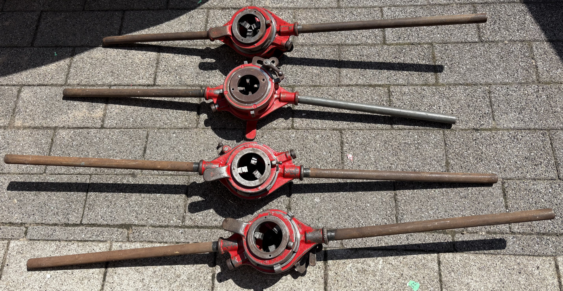 Four large Hand Pipe Threaders with detachable handles