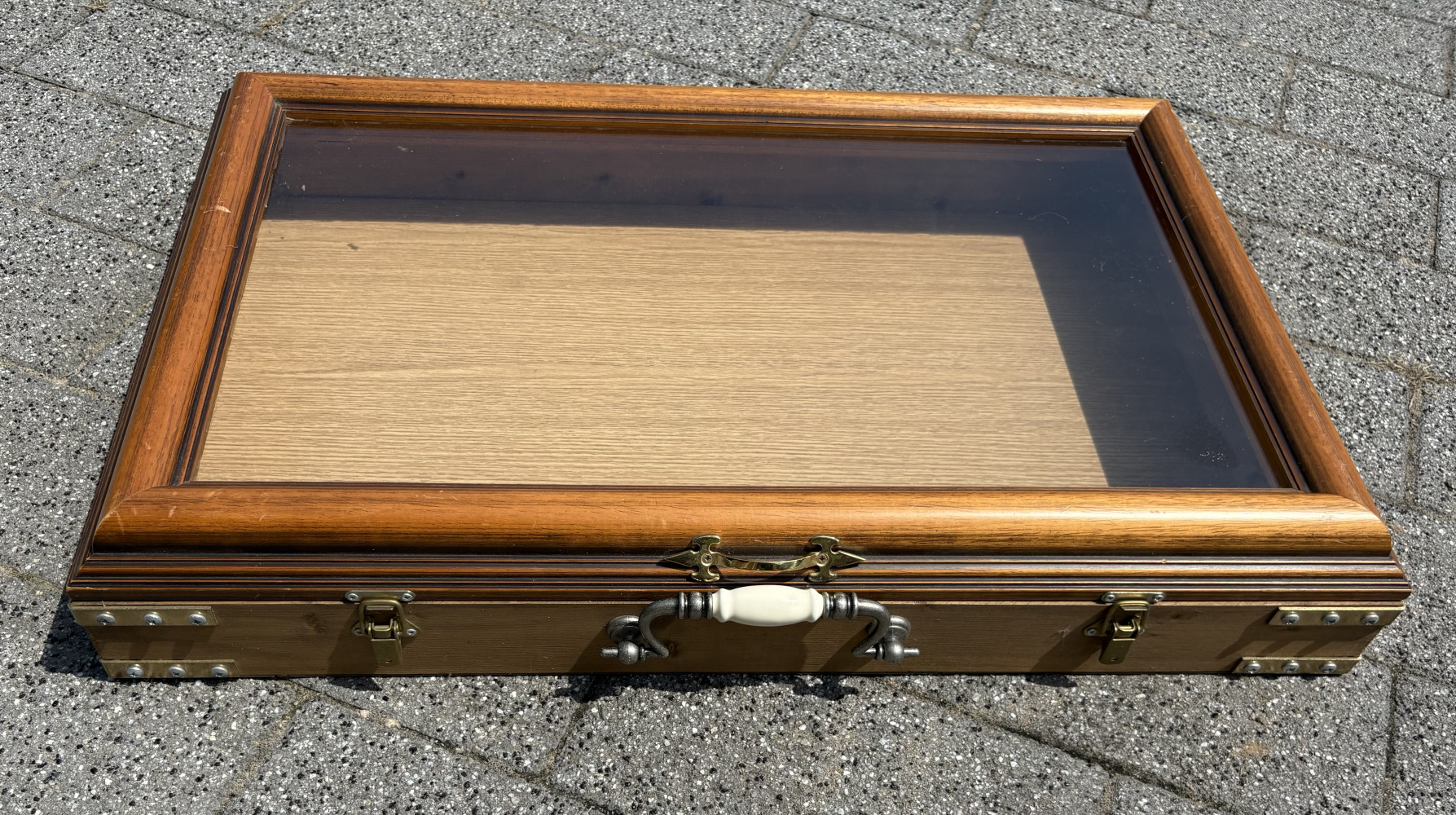 Large glass display case with latches approx 75cms x 50 cms