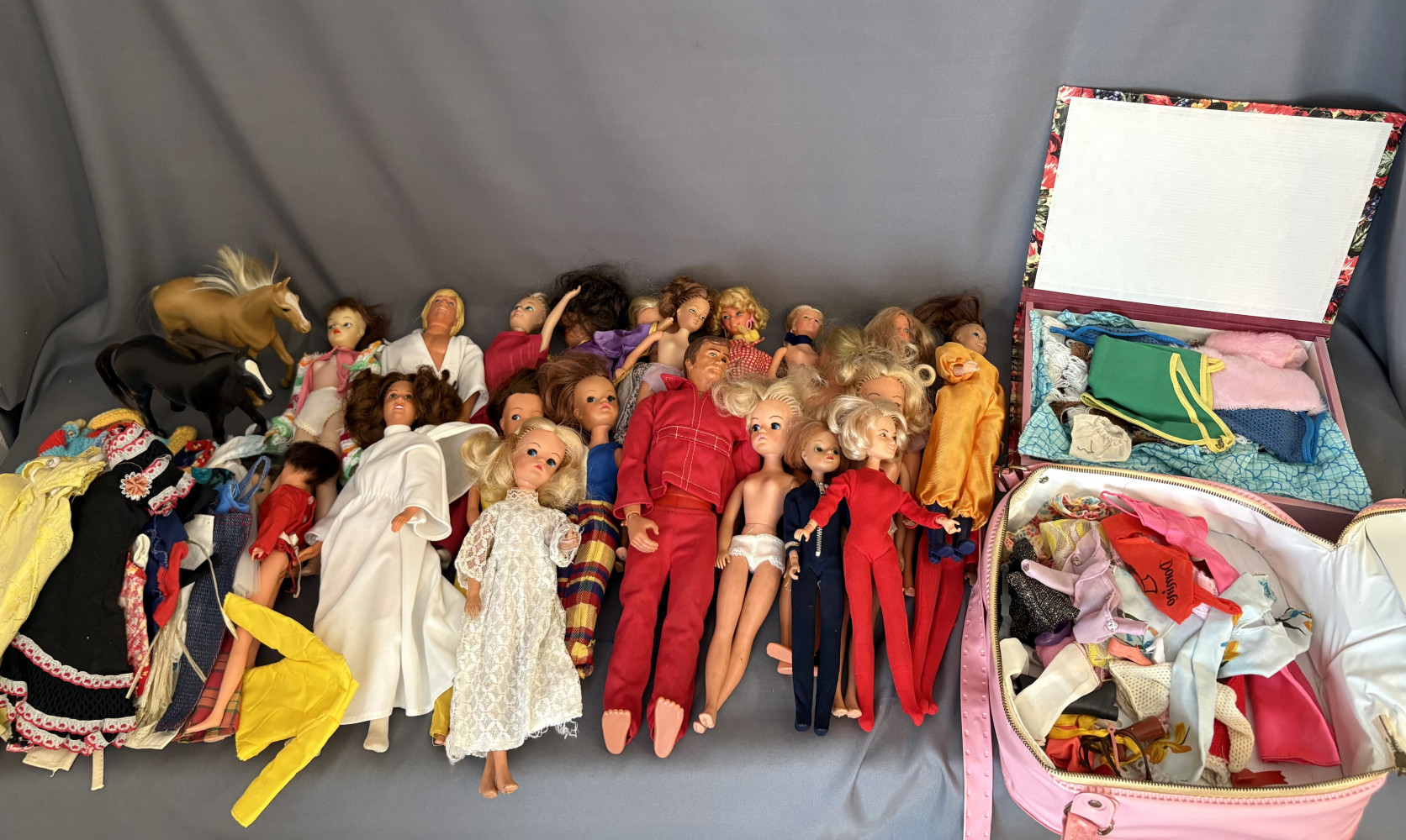 Large mixed lot of dolls some Barbie and Ken with accessories and clothes