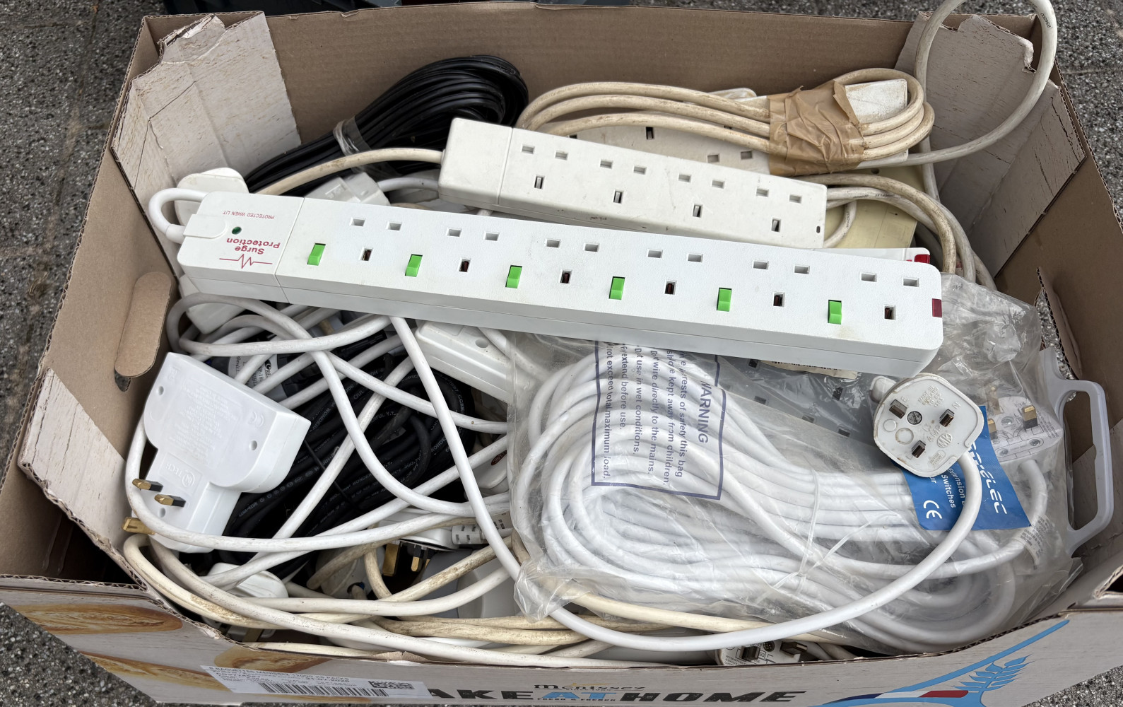 Large box full of extensions leads