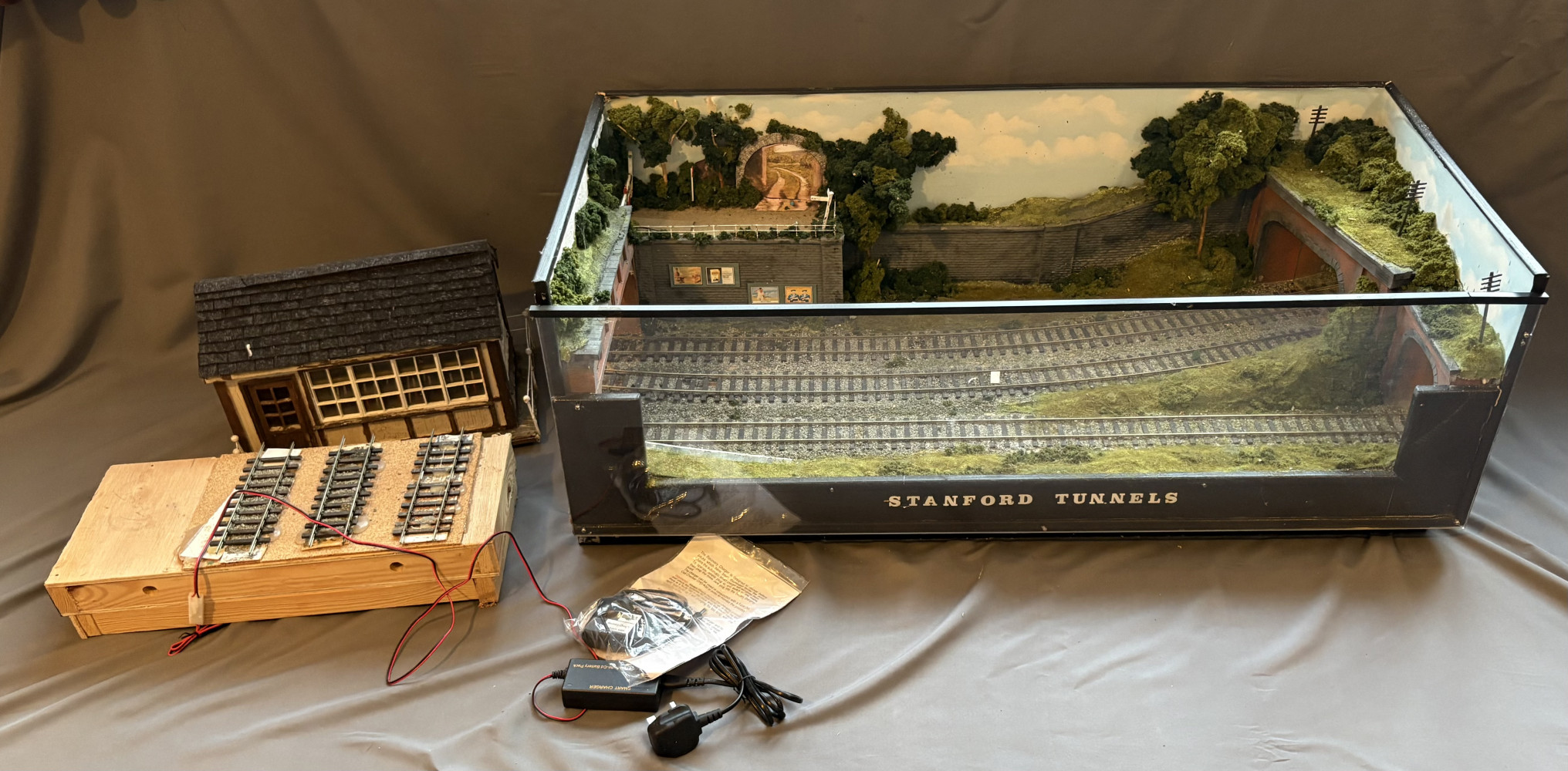 "Station Tunnels" model railway diorama, signal box with figures and other train track items