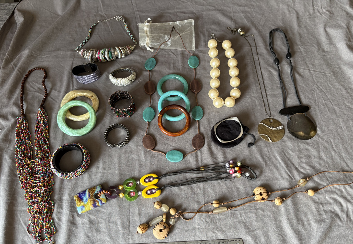 Large lots of bright and bold jewellery including a Breil bracelet