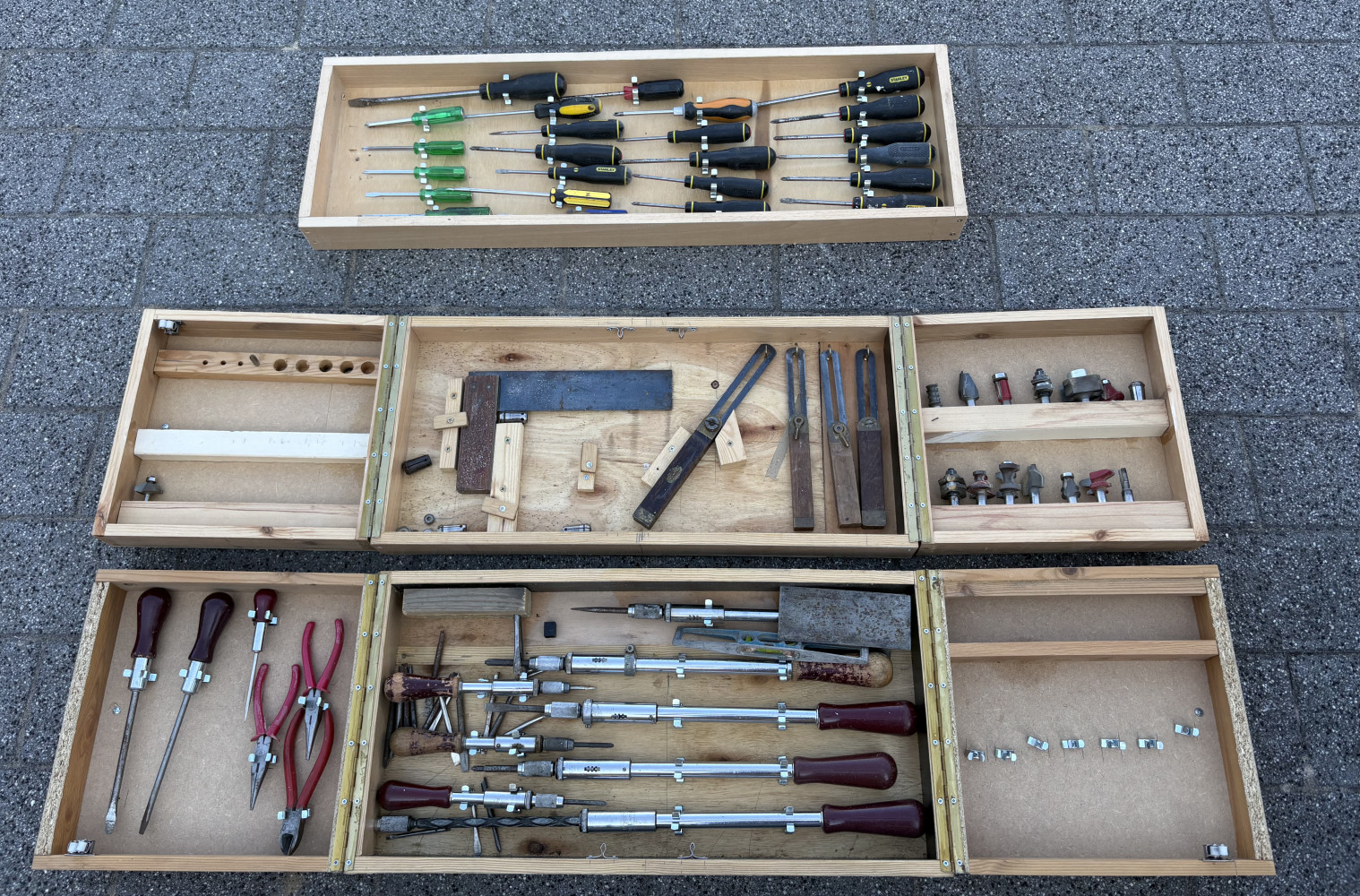 Hand made cases full of tools and router bits