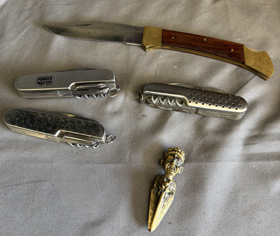 Vintage brass phurba, a ritual dagger used in Tibetan Buddhist and Hindu traditions, 3 penknives and wooden handled knife