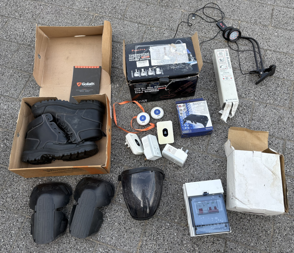 New size 9 work boots, expensive electrical switch, other new and used tools and sundries