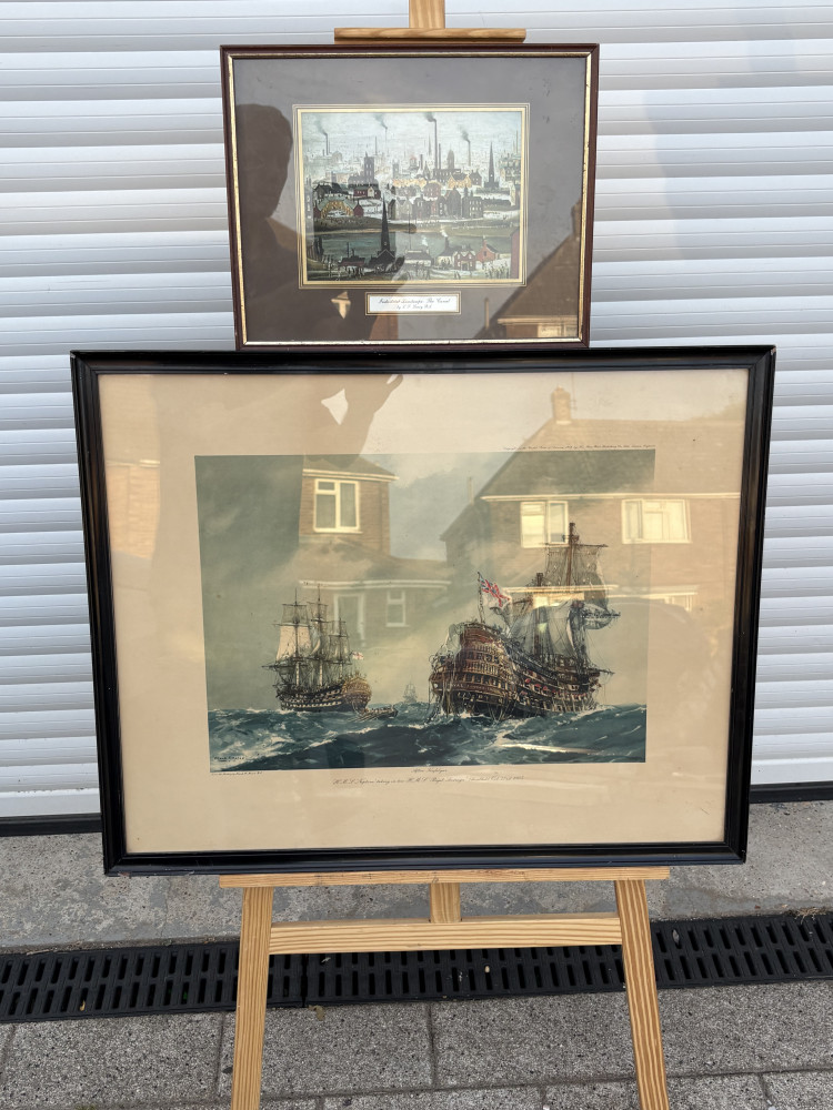 Vintage coloured print titled "After Trafalgar: HMS Neptune taken in tow HMS Royal Sovereign" by artist Frank A. Mason and art print of "Industrial Landscape: The Canal" by L.S. Lowry