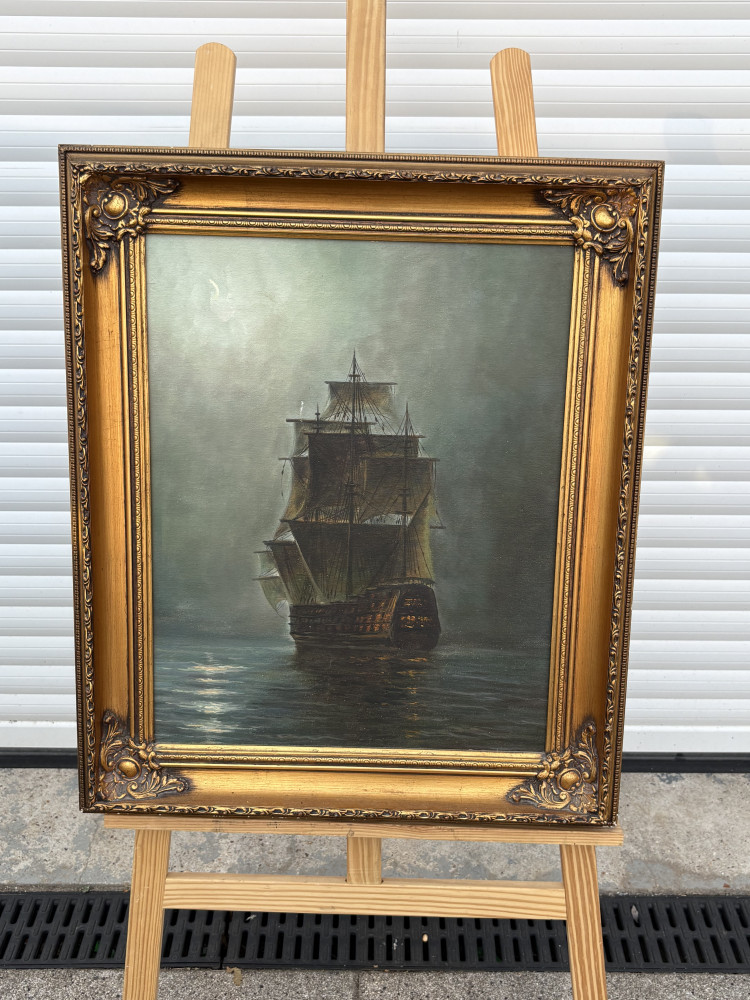 Vintage oil painting on canvas depicts a majestic sailing ship at sea under a moonlit, misty sky, fantastic piece