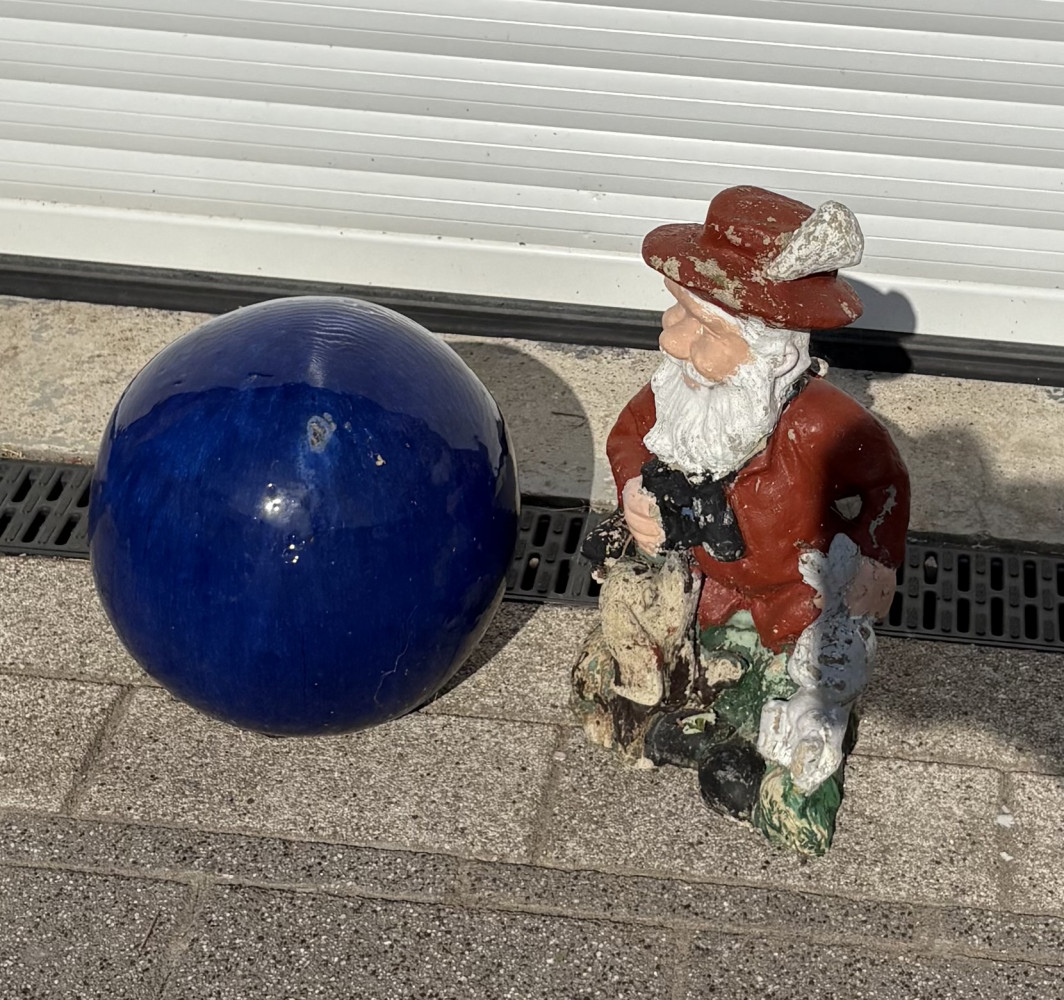 Ceramic blue garden ball and garden statue