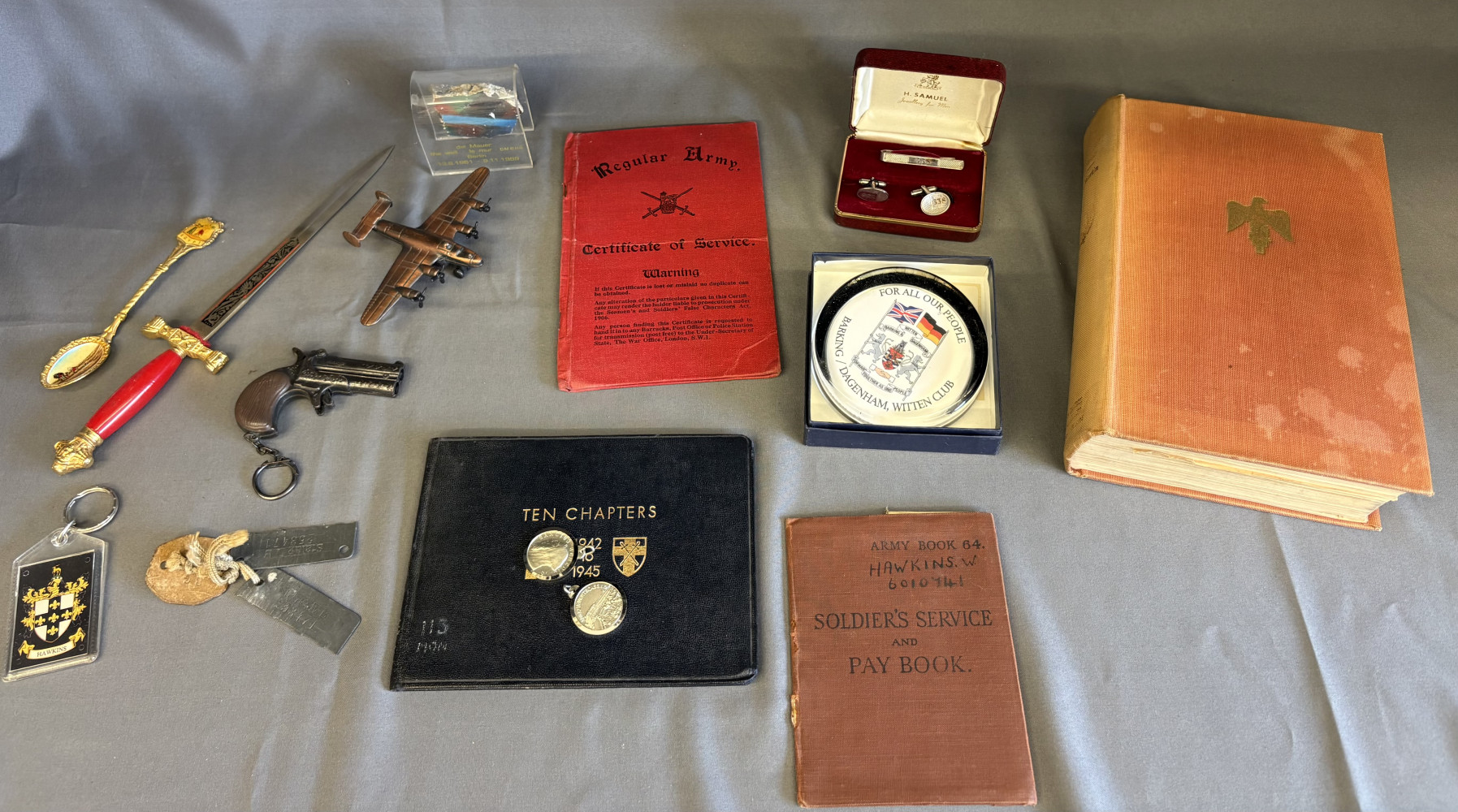 Piece of Berlin Wall, Army Soldiers books and tags and other interesting historical items