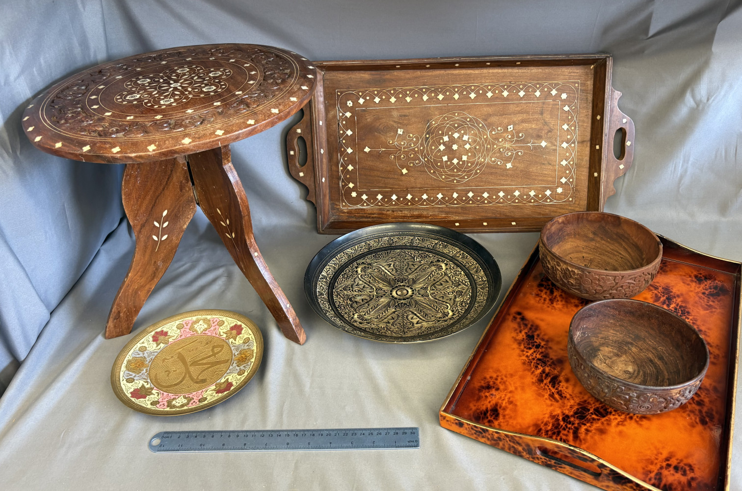 Inlaid tray and folding table, two wooden bowls, tray and two brass plates