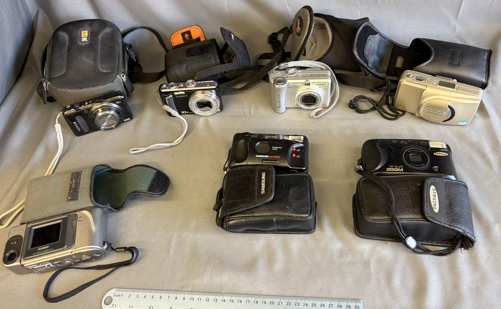 Cameras including digital cameras and others