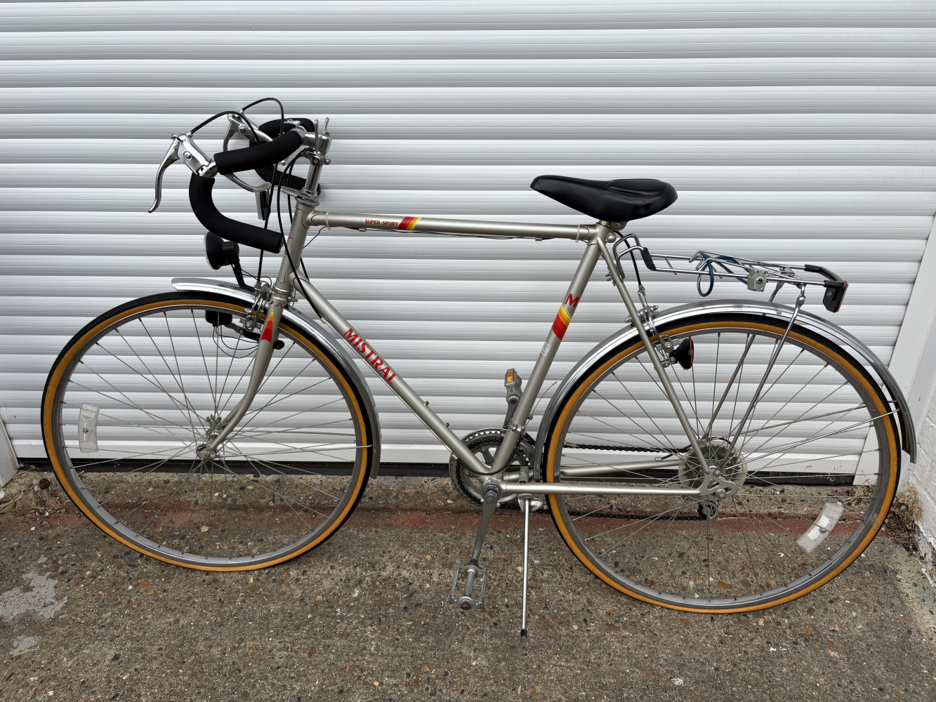 Vintage MBK Mistral Super Sport road bicycle featuring a silver steel frame